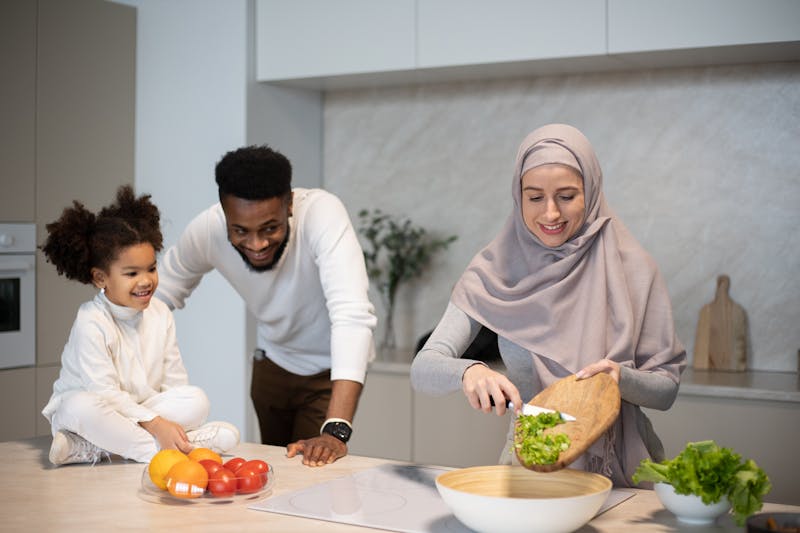 Parent and child cooking together